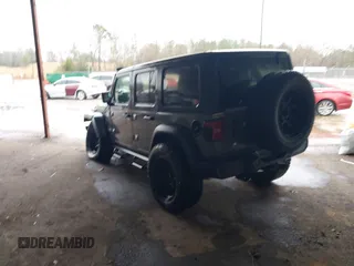 2020 Jeep Wrangler Unlimited Sport S z VIN 1C4HJXDG1LW103364, wystawiony jako IAAI lot #41541954 z przebiegiem 57 735 mil mil oraz . Historia ofert i sprzedaży dostępna na DreamBid. Obrazek 3.