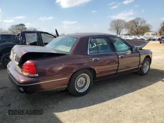 2001 Ford Crown Victoria LX z VIN 2FAFP74W31X189359, wystawiony jako Copart lot #49348255 z przebiegiem Nie podano mil oraz Nie do naprawy. Historia ofert i sprzedaży dostępna na DreamBid. Obrazek 3.
