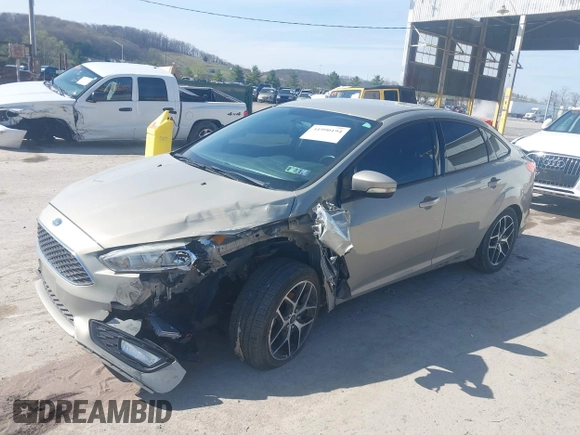 2015 Ford Focus SE with VIN 1FADP3F24FL260387, listed as a IAAI auction lot 41990194 with 80,673 mi miles. Bid and sale history available at carsss.com. Image 2.