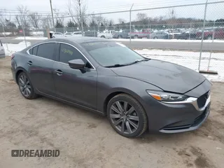 2019 Mazda 6 Grand Touring with VIN JM1GL1TY3K1510563, listed as a IAAI auction lot 41342911 with 63,970 mi miles. Bid and sale history available at carsss.com. Image 1.