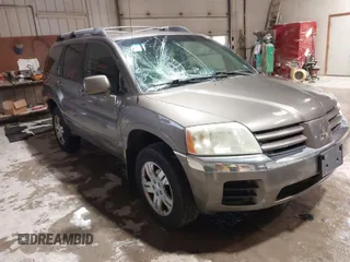 2004 Mitsubishi Endeavor XLS z VIN 4A4MN31S44E054150, wystawiony jako IAAI lot #41867238 z przebiegiem 200 239 mil mil oraz . Historia ofert i sprzedaży dostępna na DreamBid. Obrazek 1.
