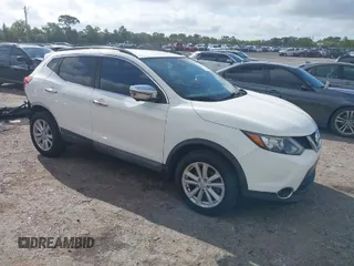 2017 Nissan Rogue SV z VIN JN1BJ1CP7HW007270, wystawiony jako IAAI lot #41908931 z przebiegiem 94 373 mil mil oraz . Historia ofert i sprzedaży dostępna na DreamBid. Obrazek 1.
