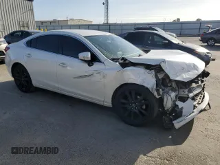 2017 Mazda Mazda6 Touring with VIN JM1GL1V54H1118672, listed as a Copart auction lot 50909805 with 73,336 mi miles and Salvage Title. Bid and sale history available at carsss.com. Image 4.