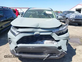 2023 Toyota RAV4 Hybrid XLE Premium z VIN JTMB6RFV8PD116502, wystawiony jako IAAI lot #41888174 z przebiegiem 19 253 mil mil oraz . Historia ofert i sprzedaży dostępna na DreamBid. Obrazek 12.