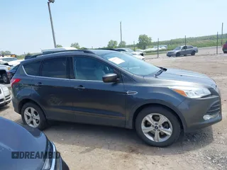 2016 Ford Escape SE with VIN 1FMCU9GX8GUB42944, listed as a IAAI auction lot 42171770 with 120,041 mi miles. Bid and sale history available at carsss.com. Image 13.