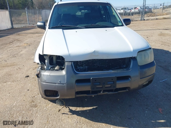2004 Ford Escape XLT with VIN 1FMYU93174KA45992, listed as a IAAI auction lot 41169340 with 308,987 mi miles. Bid and sale history available at carsss.com. Image 6.