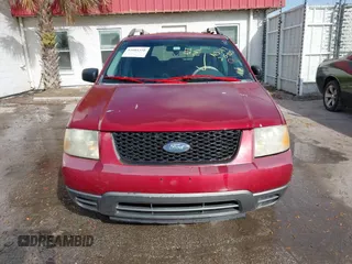 2006 Ford Freestyle SE with VIN 1FMZK01186GA13387, listed as a IAAI auction lot 41604310 with 212,885 mi miles. Bid and sale history available at carsss.com. Image 6.