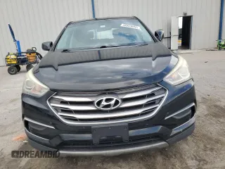 2017 Hyundai Santa Fe 2.4L z VIN 5NMZT3LB6HH040009, wystawiony jako Copart lot #58953685 z przebiegiem 161 455 mil mil oraz Szkoda całkowita • Salvage title. Historia ofert i sprzedaży dostępna na DreamBid. Obrazek 5.