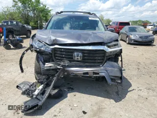 2021 Honda Ridgeline RTL-E z VIN 5FPYK3F79MB018627, wystawiony jako Copart lot #55635025 z przebiegiem 24 797 mil mil oraz Szkoda całkowita • Salvage title. Historia ofert i sprzedaży dostępna na DreamBid. Obrazek 5.