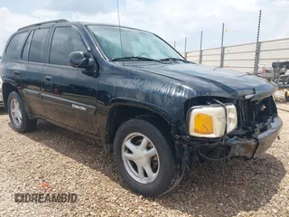 2004 GMC Envoy SLT z VIN 1GKDS13S442408935, wystawiony jako IAAI lot #42396491 z przebiegiem 312 859 mil mil oraz . Historia ofert i sprzedaży dostępna na DreamBid. Obrazek 1.