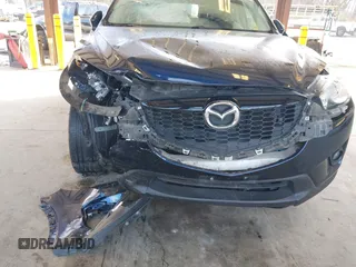 2014 Mazda CX-5 Grand Touring with VIN JM3KE2DY6E0394172, listed as a IAAI auction lot 41698468 with 89,554 mi miles. Bid and sale history available at carsss.com. Image 6.