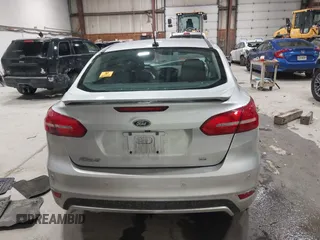 2015 Ford Focus SE with VIN 1FADP3F24FL272863, listed as a IAAI auction lot 41561084 with 103,875 mi miles. Bid and sale history available at carsss.com. Image 17.