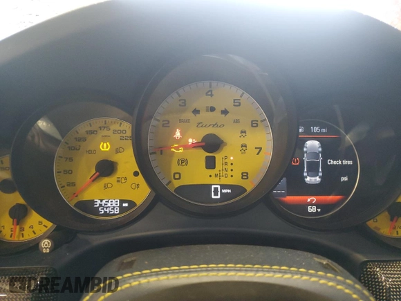 2015 Porsche 911 Turbo z VIN WP0CD2A91FS178328, wystawiony jako Copart lot #57880135 z przebiegiem 34 588 mil mil oraz Szkoda całkowita • Salvage title. Historia ofert i sprzedaży dostępna na DreamBid. Obrazek 9.
