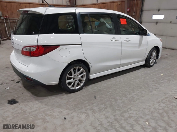 2012 Mazda Mazda5 Grand Touring with VIN JM1CW2DL9C0100114, listed as a IAAI auction lot 42038998 with 160,651 mi miles. Bid and sale history available at carsss.com. Image 4.