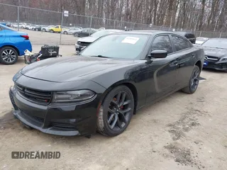 2019 Dodge Charger SXT with VIN 2C3CDXBG2KH745100, listed as a IAAI auction lot 41783611 with 81,805 mi miles. Bid and sale history available at carsss.com. Image 2.