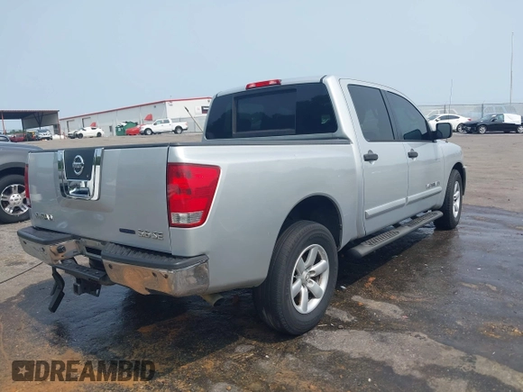 2010 Nissan Titan SE with VIN 1N6BA0ED7AN319933, listed as a IAAI auction lot 42385986 with 273,974 mi miles and . Bid and sale history available at DreamBid. Image 4.