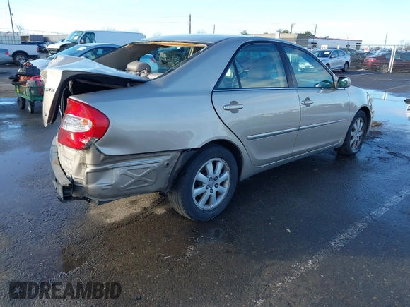 2004 Toyota Camry LE with VIN 4T1BF30K24U577908, listed as a IAAI auction lot 41591147 with 151,678 mi miles and . Bid and sale history available at DreamBid. Image 4.