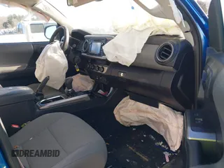 2018 Toyota Tacoma SR with VIN 3TMCZ5AN7JM128860, listed as a IAAI auction lot 41251397 with 97,246 mi miles. Bid and sale history available at carsss.com. Image 5.