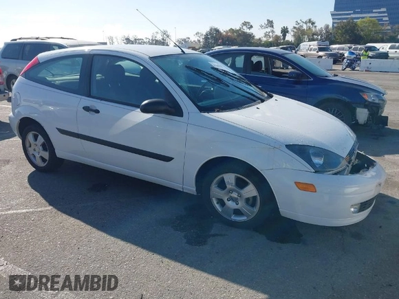 2003 Ford Focus ZX3 with VIN 3FAFP31ZX3R163723, listed as a IAAI auction lot 41866542 with 83,370 mi miles and . Bid and sale history available at DreamBid. Image 1.