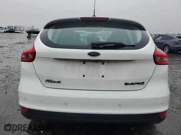 2016 Ford Focus Electric z VIN 1FADP3R42GL234563, wystawiony jako Copart lot #43955695 z przebiegiem 66 636 mil mil oraz Szkoda całkowita • Salvage title. Historia ofert i sprzedaży dostępna na DreamBid. Obrazek 6.