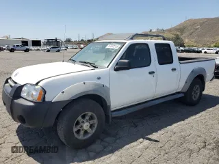 2002 Nissan Frontier XE z VIN 1N6ED29X12C379157, wystawiony jako Copart lot #57347215 z przebiegiem 206 559 mil mil oraz Czysty tytuł • Clean title. Historia ofert i sprzedaży dostępna na DreamBid. Obrazek 1.