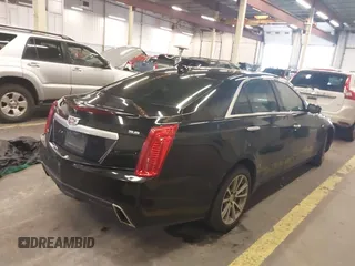 2019 Cadillac CTS Luxury AWD with VIN 1G6AX5SSXK0145788, listed as a IAAI auction lot 40898982 with 92,316 mi miles and . Bid and sale history available at DreamBid. Image 4.