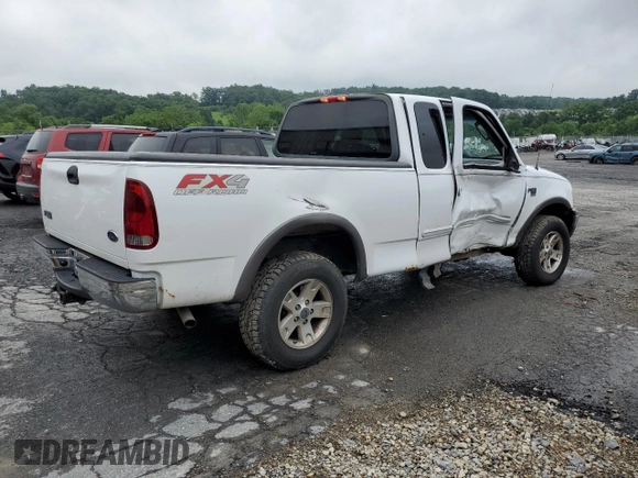 2003 Ford F-150 XL with VIN 1FTRX18L33NA43522, listed as a Copart auction lot 61197615 with 101,061 mi miles and Salvage title. Bid and sale history available at DreamBid. Image 3.