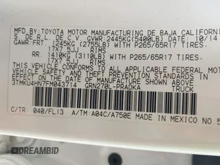 2015 Toyota Tacoma PreRunner with VIN 3TMKU4HN7FM043714, listed as a IAAI auction lot 42179707 with 151,092 mi miles and . Bid and sale history available at DreamBid. Image 9.