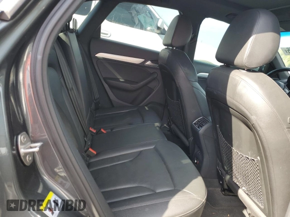 2018 Audi Q3 Premium with VIN WA1BCCFS4JR019085, listed as a Copart auction lot 57676375 with 94,743 mi miles and Salvage title. Bid and sale history available at DreamBid. Image 11.