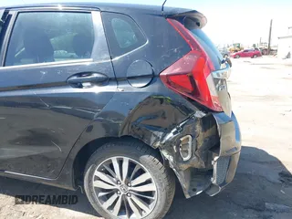 2015 Honda Fit EX-L z VIN 3HGGK5H88FM706513, wystawiony jako IAAI lot #42493772 z przebiegiem 173 129 mil mil oraz . Historia ofert i sprzedaży dostępna na DreamBid. Obrazek 12.