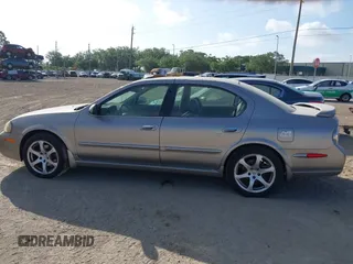 2003 Nissan Maxima GLE z VIN JN1DA31A83T411224, wystawiony jako IAAI lot #41905714 z przebiegiem Nie podano mil oraz . Historia ofert i sprzedaży dostępna na DreamBid. Obrazek 14.