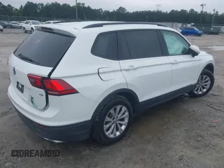 2018 Volkswagen Tiguan S with VIN 3VV1B7AX1JM032250, listed as a IAAI auction lot 42366790 with 65,406 mi miles and . Bid and sale history available at DreamBid. Image 4.