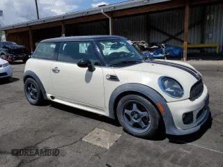 2013 MINI Hardtop with VIN WMWSU3C58DT373021, listed as a Copart auction lot 52945845 with 83,865 mi miles and Salvage Title. Bid and sale history available at DreamBid. Image 4.