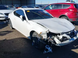 2013 Subaru BRZ Limited with VIN JF1ZCAC18D1604653, listed as a IAAI auction lot 41276046 with 123,679 mi miles. Bid and sale history available at carsss.com. Image 1.