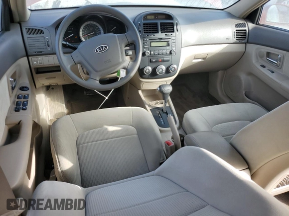 2007 Kia Spectra EX with VIN KNAFE121775427693, listed as a Copart auction lot 76727994 with 100,197 mi miles and Salvage Title. Bid and sale history available at carsss.com. Image 8.