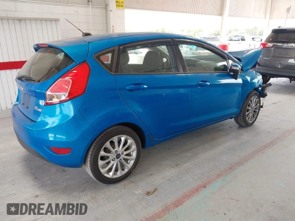 2014 Ford Fiesta SE with VIN 3FADP4EJ7EM204438, listed as a IAAI auction lot 42098291 with 184,930 mi miles and . Bid and sale history available at DreamBid. Image 4.