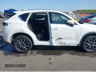 2017 Mazda CX-5 Grand Touring with VIN JM3KFADLXH0222341, listed as a IAAI auction lot 41990464 with 94,374 mi miles and . Bid and sale history available at carsss.com. Image 6.
