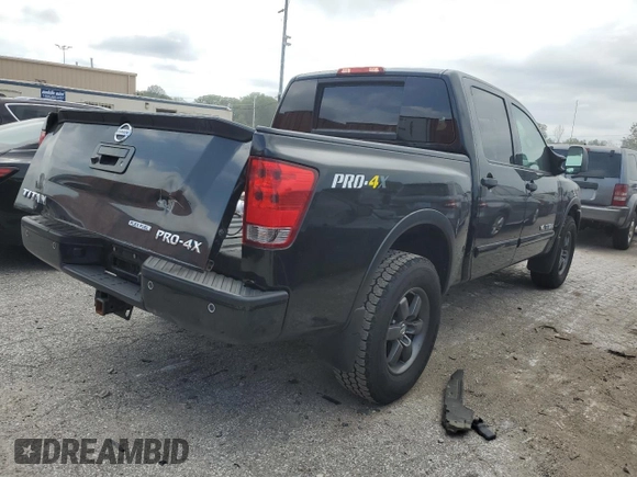 2015 Nissan Titan Pro-4X with VIN 1N6BA0EC1FN507894, listed as a Copart auction lot 65784274 with 147,576 mi miles and Salvage title. Bid and sale history available at DreamBid. Image 3.