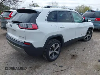 2019 Jeep Cherokee Limited with VIN 1C4PJLDB1KD387310, listed as a IAAI auction lot 42190270 with 96,635 mi miles and . Bid and sale history available at DreamBid. Image 4.