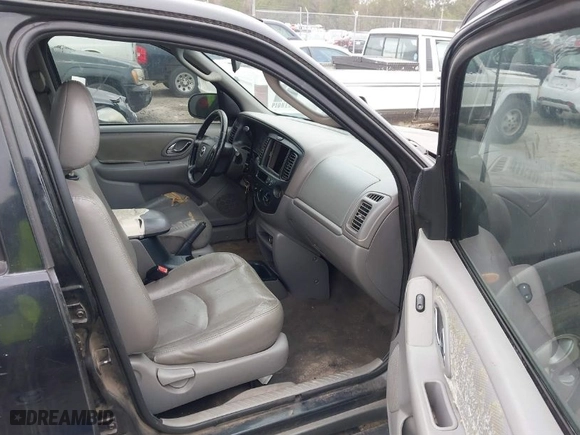 2002 Mazda Tribute LX with VIN 4F2YU08192KM35689, listed as a IAAI auction lot 41356009 with 217,866 mi miles. Bid and sale history available at carsss.com. Image 5.