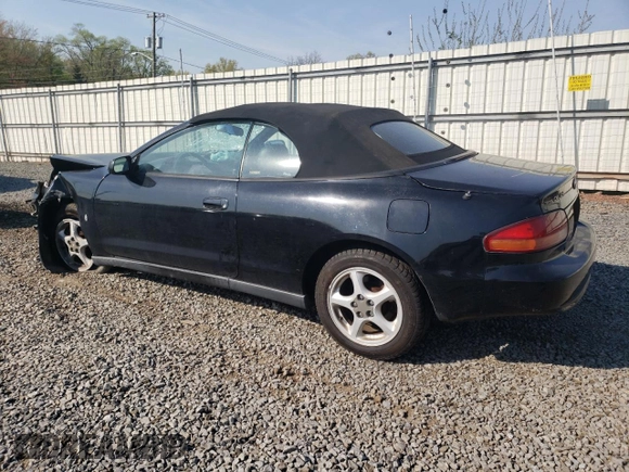 1997 Toyota Celica GT z VIN JT5FG02T2V0044842, wystawiony jako Copart lot #54335965 z przebiegiem 203 152 mil mil oraz Szkoda całkowita • Salvage title. Historia ofert i sprzedaży dostępna na DreamBid. Obrazek 2.