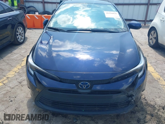 2023 Toyota Corolla Hybrid LE with VIN JTDBCMFE5PJ003037, listed as a IAAI auction lot 40168826 with 50,709 mi miles. Bid and sale history available at carsss.com. Image 12.