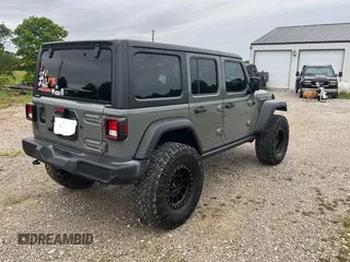 2019 Jeep Wrangler Unlimited Sport S with VIN 1C4HJXDG9KW569235, listed as a Copart auction lot 60338215 with 47,107 mi miles and Clean title. Bid and sale history available at DreamBid. Image 4.