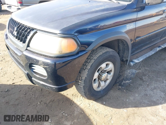 2002 Mitsubishi Montero ES z VIN JA4LS21H72J054989, wystawiony jako IAAI lot #41067504 z przebiegiem 335 479 mil mil oraz . Historia ofert i sprzedaży dostępna na DreamBid. Obrazek 6.