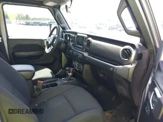 2020 Jeep Gladiator Sport S with VIN 1C6HJTAG7LL128940, listed as a IAAI auction lot 42108154 with 90,596 mi miles and . Bid and sale history available at DreamBid. Image 5.