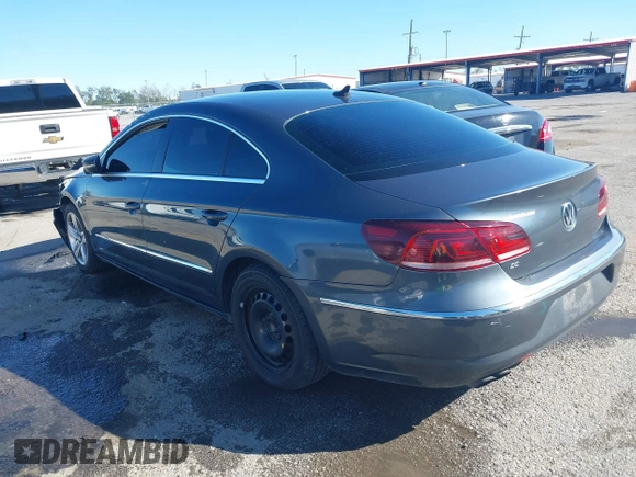 2014 Volkswagen CC R-Line with VIN WVWBN7AN1EE518173, listed as a IAAI auction lot 40895187 with 133,960 mi miles. Bid and sale history available at carsss.com. Image 3.