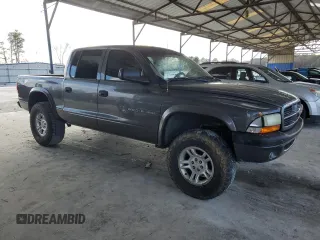 2002 Dodge Dakota Sport with VIN 1B7HG38N12S515919, listed as a Copart auction lot 42930835 with 180,701 mi miles and Salvage Title. Bid and sale history available at carsss.com. Image 4.
