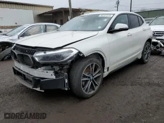 2022 BMW X2 xDrive28i with VIN WBXYJ1C04N5T43098, listed as a Copart auction lot 48757315 with 63,716 mi miles and Salvage Title. Bid and sale history available at carsss.com. Image 1.