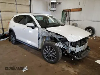 2018 Mazda CX-5 Grand Touring with VIN JM3KFBDM6J0455993, listed as a Copart auction lot 61414275 with 77,570 mi miles and Salvage title. Bid and sale history available at DreamBid. Image 4.