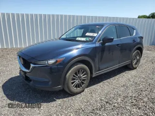 2020 Mazda CX-5 Touring z VIN JM3KFBCM0L0855309, wystawiony jako Copart lot #59359875 z przebiegiem 126 279 mil mil oraz Czysty tytuł • Clean title. Historia ofert i sprzedaży dostępna na DreamBid. Obrazek 1.